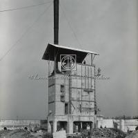 Edificio con ciminiera ricostruito